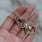 Golden Spider with Garnet necklace 1