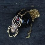 Golden Spider with Garnet necklace